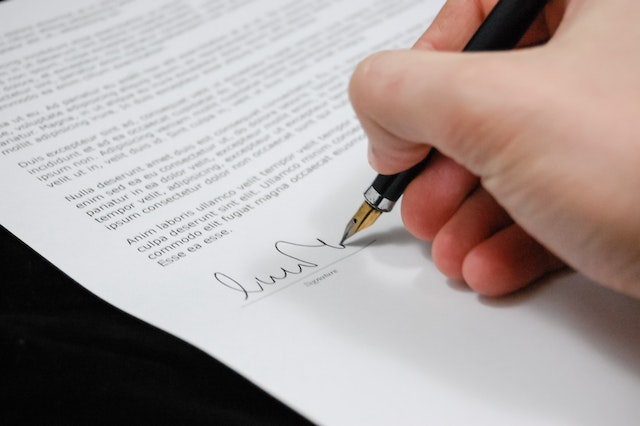 Example of a legally binding contract being signed