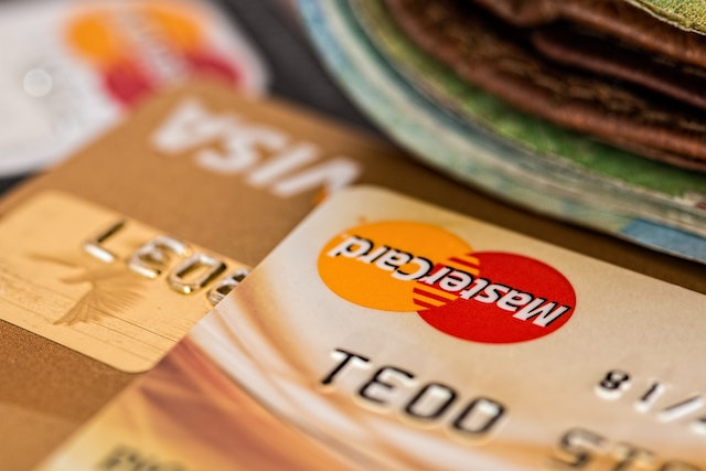Close-up of Visa and Mastercard credit cards stacked together