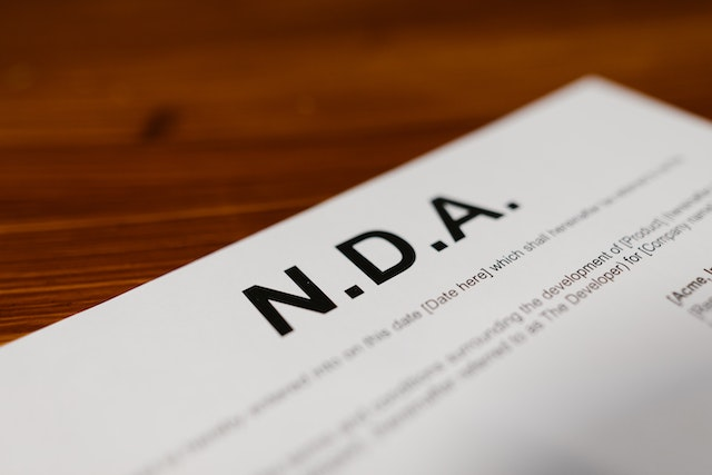 Close-up of a Non-Disclosure Agreement (NDA) document — highlighting the importance of legal documents like proforma invoices in securing business transactions.